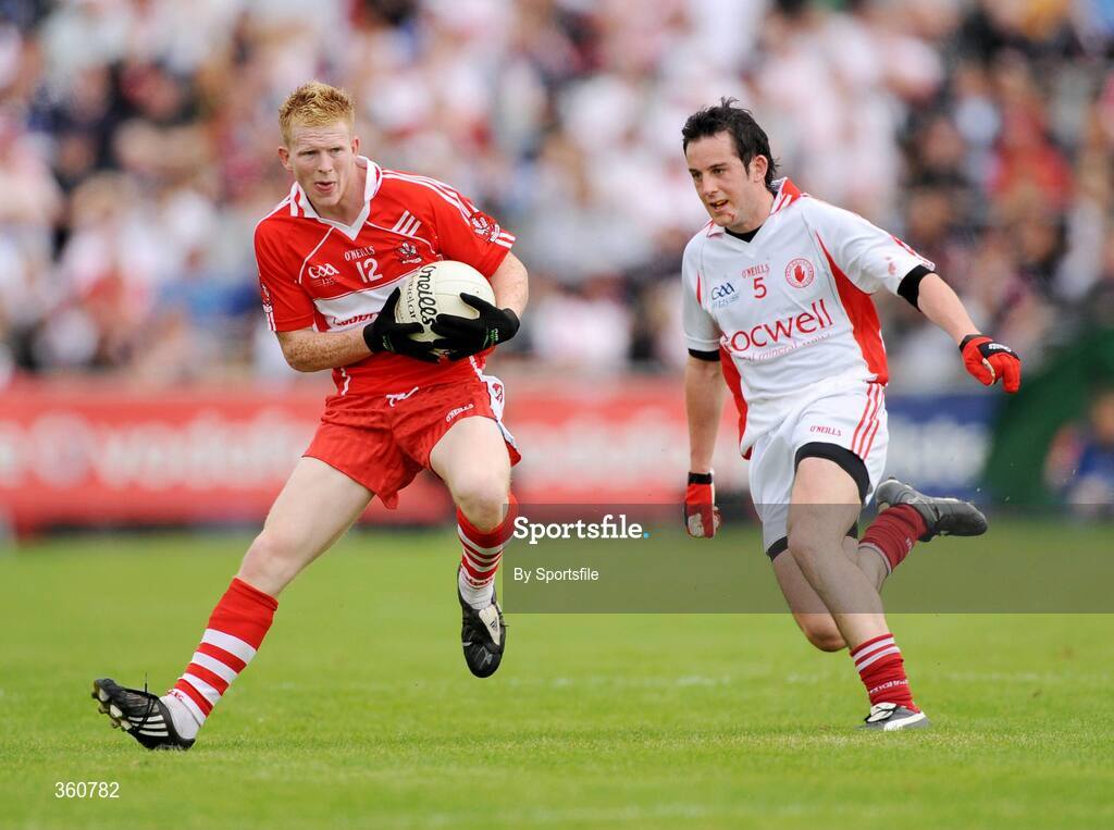 21 June 2009; Enda Lynn, Derry, in action against Davy Harte, Tyrone. GAA Football Ulster Senior Championship Semi-Final, Tyrone v Derry, Casement Park, Belfast, Co. Antrim. Photo by Sportsfile