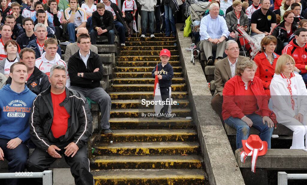 21 June 2009; A young Derry supporter watches the match from the stand. GAA Football Ulster Senior Championship Semi-Final, Tyrone v Derry, Casement Park, Belfast, Co. Antrim. Picture credit: Oliver McVeigh / SPORTSFILE
