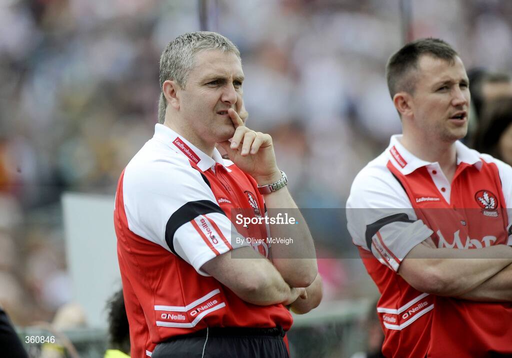 21 June 2009; Derry manager, Damien Cassidy, watches from the sideline. GAA Football Ulster Senior Championship Semi-Final, Tyrone v Derry, Casement Park, Belfast, Co. Antrim. Picture credit: Oliver McVeigh / SPORTSFILE