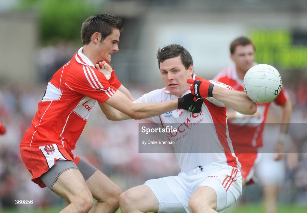 21 June 2009; Conor Gormley, Tyrone, in action against Chrissy McKaigue, Derry. GAA Football Ulster Senior Championship Semi-Final, Tyrone v Derry, Casement Park, Belfast, Co. Antrim. Picture credit: Daire Brennan / SPORTSFILE