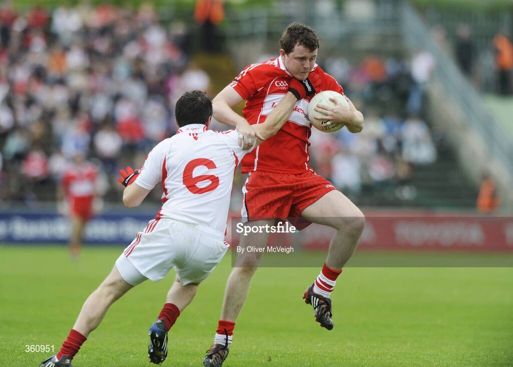 21 June 2009; Barry McGoldrick, Derry, in action against Conor Gormley, Tyrone. GAA Football Ulster Senior Championship Semi-Final, Tyrone v Derry, Casement Park, Belfast, Co. Antrim. Picture credit: Oliver McVeigh / SPORTSFILE