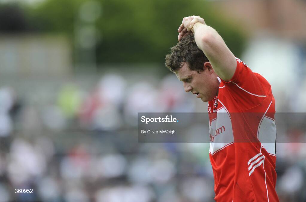 21 June 2009; A dejected Barry McGoldrick, Derry, after the final whistle. GAA Football Ulster Senior Championship Semi-Final, Tyrone v Derry, Casement Park, Belfast, Co. Antrim. Picture credit: Oliver McVeigh / SPORTSFILE