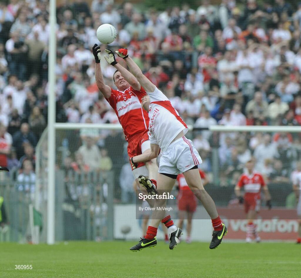 21 June 2009; Joe Diver, Derry, in action against Enda McGinley, Tyrone. GAA Football Ulster Senior Championship Semi-Final, Tyrone v Derry, Casement Park, Belfast, Co. Antrim. Picture credit: Oliver McVeigh / SPORTSFILE
