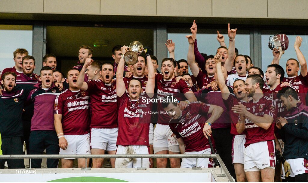 25 October 2015; Cushendall celebrate with the cup. AIB GAA Hurling Ulster GAA Senior Club Championship Final, Cushendall v Slaughtneil Ruairí Óg. Athletic Grounds, Armagh. Picture credit: Oliver McVeigh / SPORTSFILE
