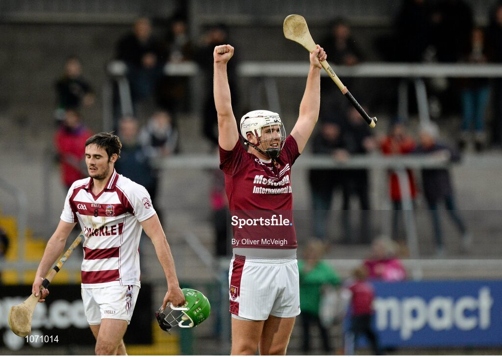 25 October 2015; Conor Carson, Cushendall, celebrates at the final whistle at Christy McCaigue, Slaughtneil, looks on in dejection. AIB GAA Hurling Ulster GAA Senior Club Championship Final, Cushendall v Slaughtneil Ruairí Óg. Athletic Grounds, Armagh. Picture credit: Oliver McVeigh / SPORTSFILE
