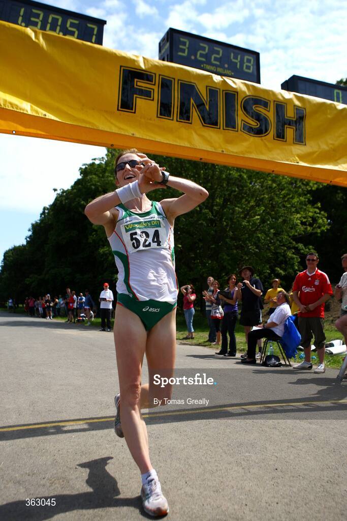 27 June 2009; Olive Loughnane, Ireland, crosses the line to win the Women's 20k walk race. Dublin Grand Prix of Race Walking. Phoenix Park, Dublin. Picture credit: Tomas Greally / SPORTSFILE