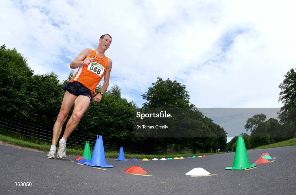 27 June 2009; A competitor takes the bend during the Men's 20K walk race. Dublin Grand Prix of Race Walking. Phoenix Park, Dublin. Picture credit: Tomas Greally / SPORTSFILE