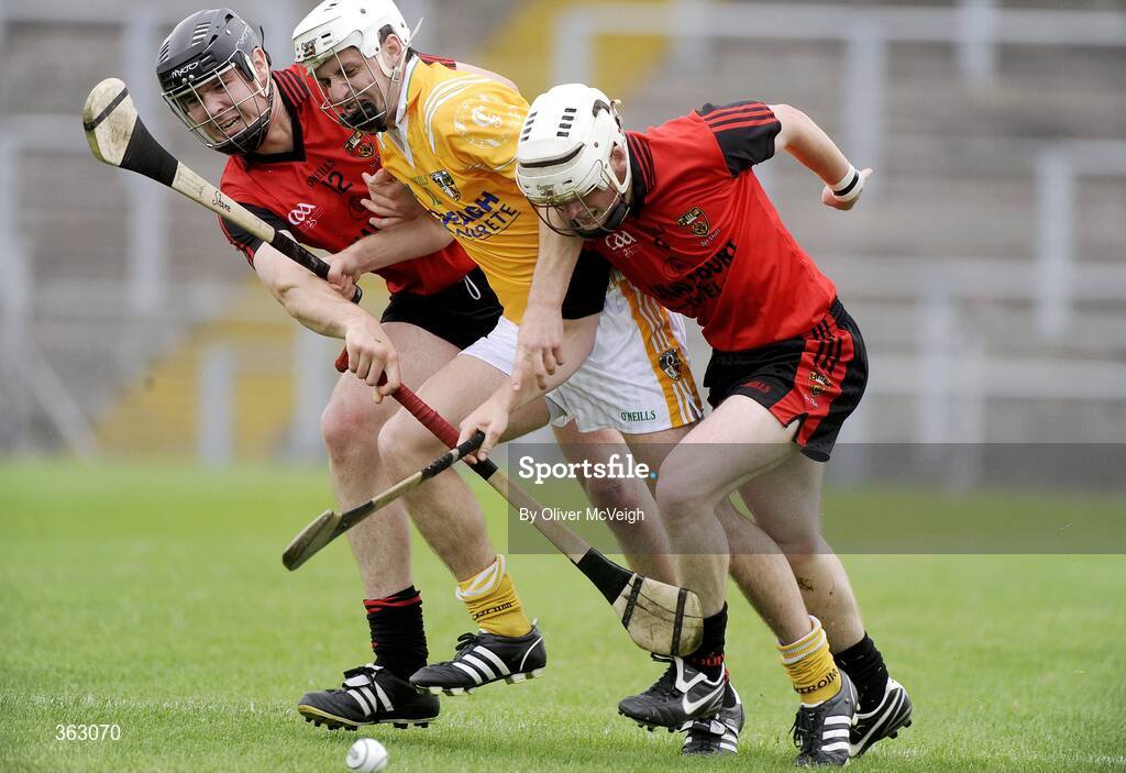 28 June 2009; Shane McNaughton, Anrtrim, in action against Sean Ennis and Kieran Courtney, Down. GAA Hurling Ulster Senior Championship Final, Antrim v Down, Casement Park, Belfast, Co. Antrim. Picture credit: Oliver McVeigh / SPORTSFILE *** Local Caption ***