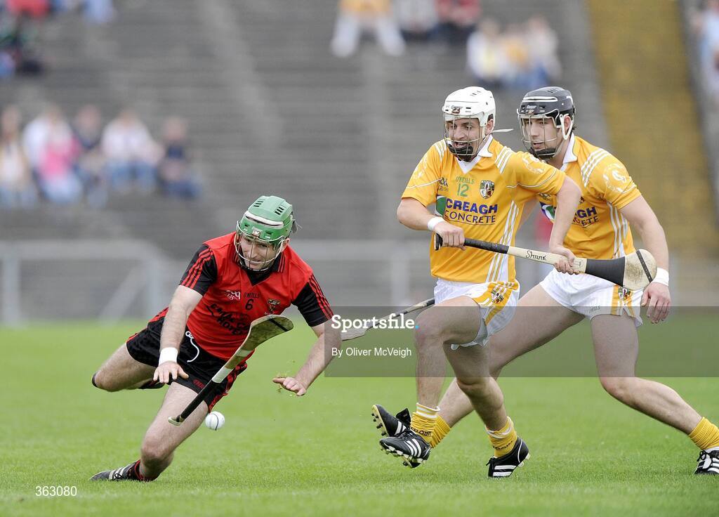 28 June 2009; Ruari McGrattan, Down, in action against Shane McNaughton and Cormac Donnelly, Anrtrim. GAA Hurling Ulster Senior Championship Final, Antrim v Down, Casement Park, Belfast, Co. Antrim. Picture credit: Oliver McVeigh / SPORTSFILE *** Local Caption ***