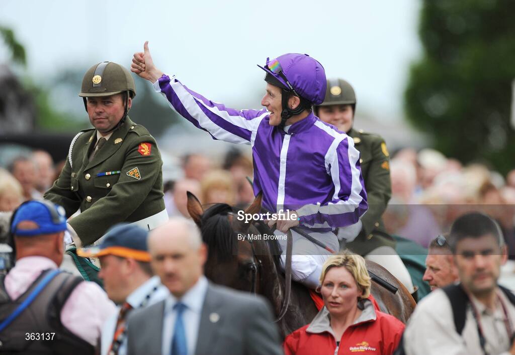 28 June 2009; Johnny Murtagh celebrates after winning the Dubai Duty Free Irish Derby onboard Fame And Glory. Irish Derby Festival - Sunday, Curragh Racecourse, Co. Kildare. Picture credit: Matt Browne / SPORTSFILE