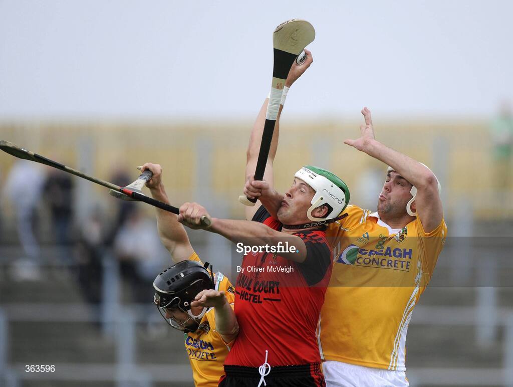 28 June 2009; Gareth Johnston, Down, in action against Cormac Donnelly and Johnny Campbell, Antrim. GAA Hurling Ulster Senior Championship Final, Antrim v Down, Casement Park, Belfast, Co. Antrim. Picture credit: Oliver McVeigh / SPORTSFILE