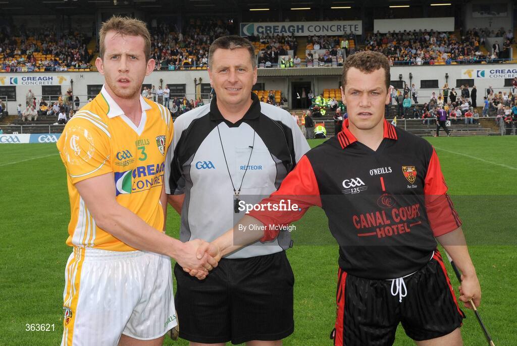 28 June 2009; Referee Brian Gavin with Antrim captain Neil McGarry, left, and Down captain Graham Clarke before the start of the game. GAA Hurling Ulster Senior Championship Final, Antrim v Down, Casement Park, Belfast, Co. Antrim. Picture credit: Oliver McVeigh / SPORTSFILE