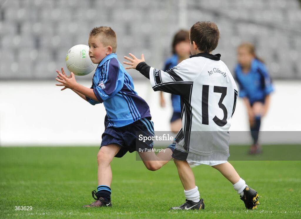 1 July 2009; Eoin Bagnell, Allenwood, Co. Kildare, in action against Jack Reynolds, 13, Clara, Co. Offaly, during the Leinster GAA Go Games ‘Play & Stay with the GAA’ activity day. Croke Park, Dublin. Picture credit: Pat Murphy / SPORTSFILE