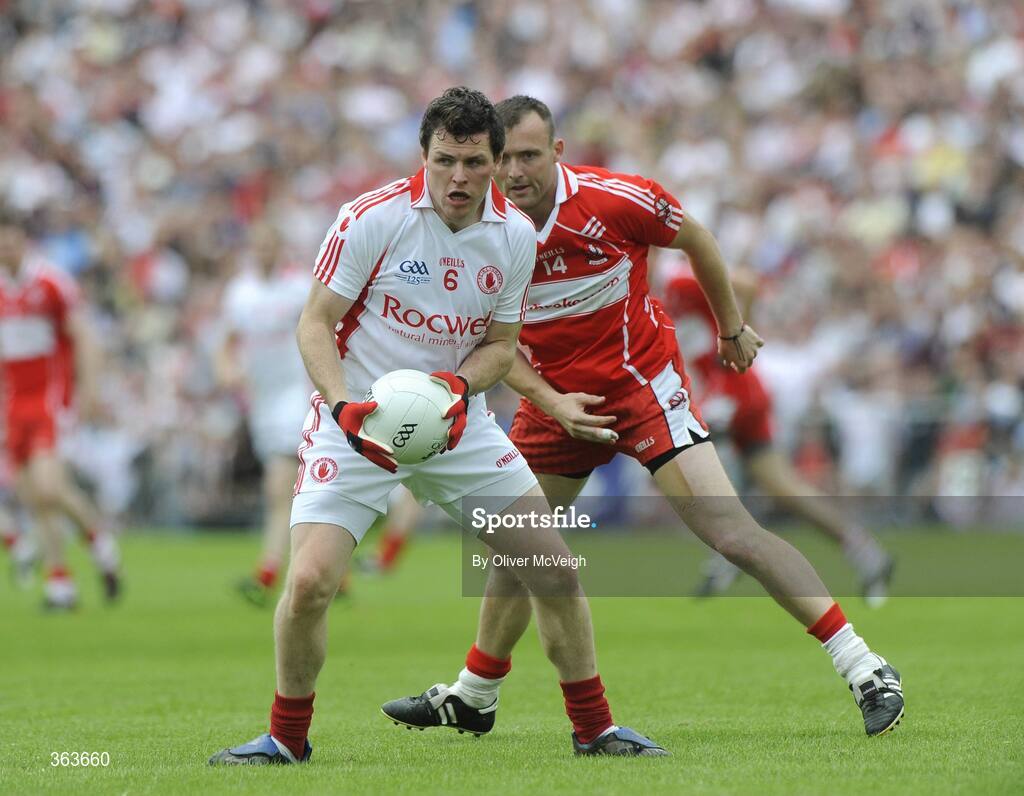 21 June 2009; Conor Gormley, Tyrone, in action against Paddy Bradley, Derry. GAA Football Ulster Senior Championship Semi-Final, Tyrone v Derry, Casement Park, Belfast, Co. Antrim. Picture credit: Oliver McVeigh / SPORTSFILE