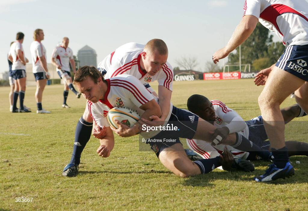 1 July 2009; British and Irish Lions' Mike Blair, in possession, is tackled by team-mates Keith Earls, left, and Ugo Monye during squad training ahead of their 3rd Test game against South Africa on Saturday. British and Irish Lions Squad Training, St. David's School, Inanda, Johannesburg, South Africa. Picture credit: Andrew Fosker / SPORTSFILE