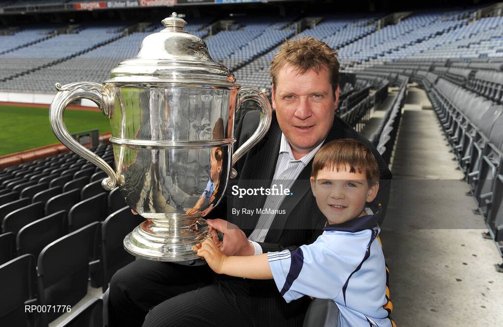 1 July 2009; The Bob O'Keeffe Cup, TV3 hurling panellist Daithi Regan and Oscar Holden, 2 and 1/2 years, at the TV3 Silverware Sunday photocall. Croke Park, Dublin. Picture credit: Ray McManus / SPORTSFILE