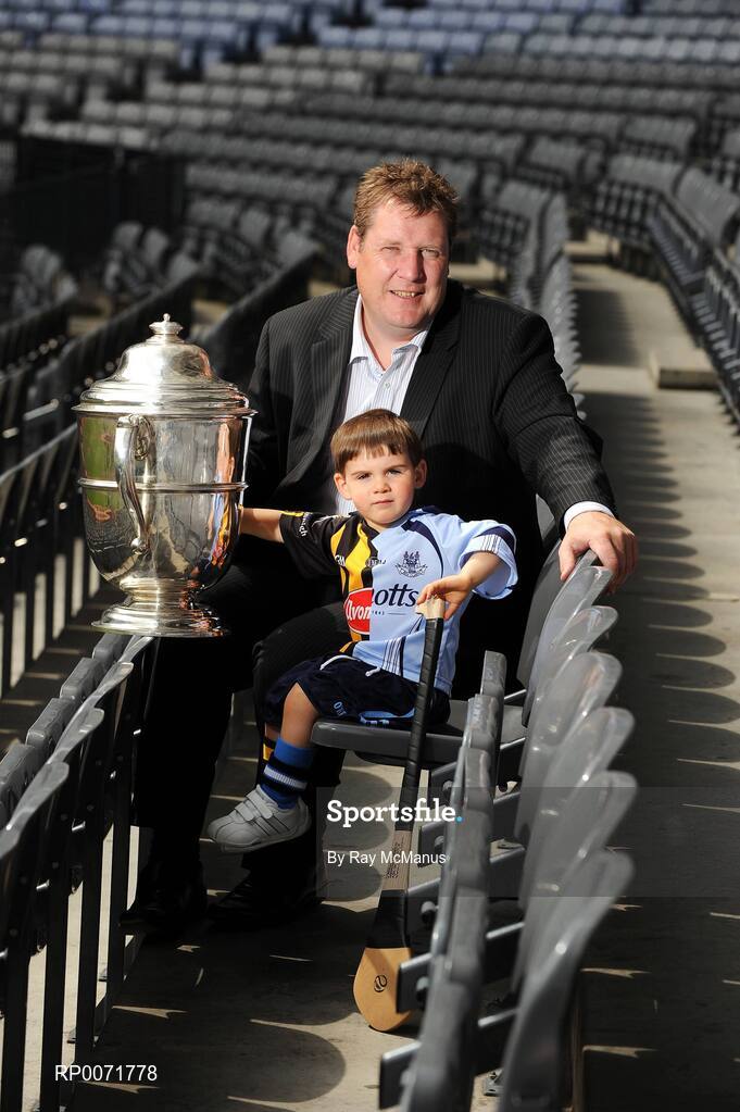 1 July 2009; The Bob O'Keeffe Cup, TV3 hurling panellist Daithi Regan and Oscar Holden, 2 and 1/2 years, at the TV3 Silverware Sunday photocall. Croke Park, Dublin. Picture credit: Ray McManus / SPORTSFILE  *** Local Caption ***