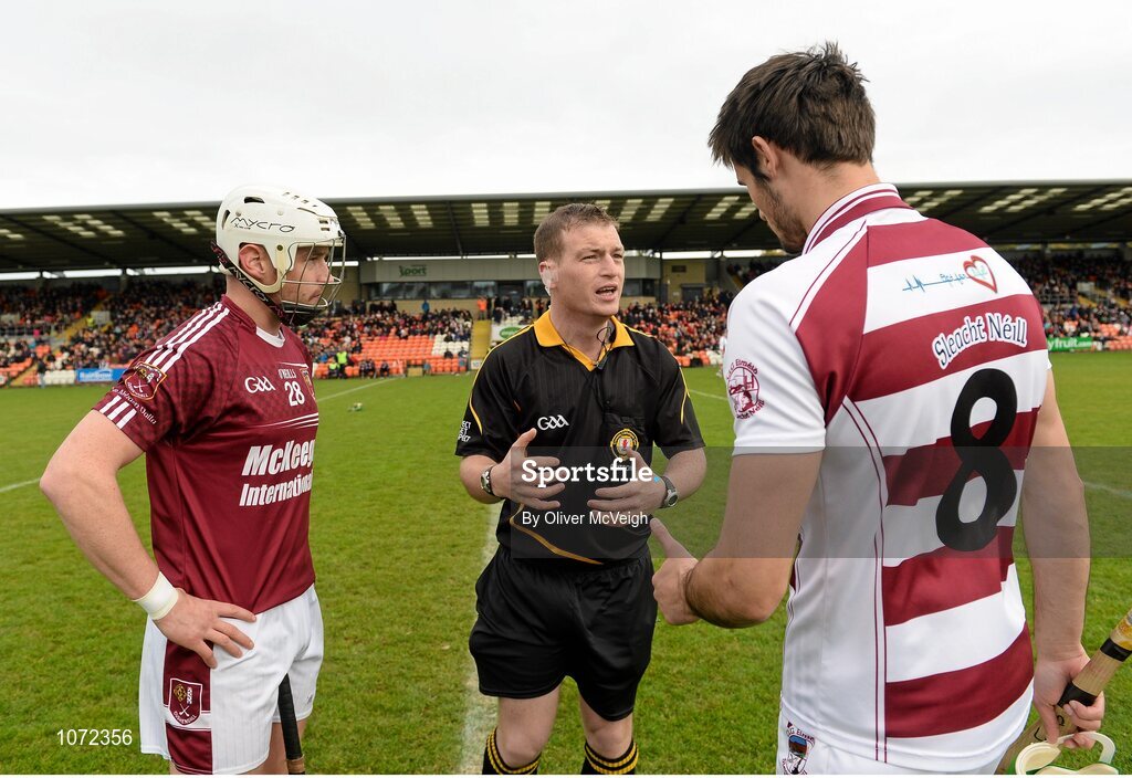 25 October 2015; Referee James Clarke speaks to Aaron Graffin, Cushendall captain and Christy McKaigue, Slaughtneil captain during the toss. AIB GAA Hurling Ulster GAA Senior Club Championship Final, Cushendall v Slaughtneil. Athletic Grounds, Armagh. Picture credit: Oliver McVeigh / SPORTSFILE