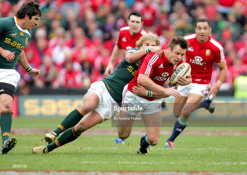 4 July 2009; Tommy Bowe, British and Irish Lions, tries to escape a Wynand Olivier, South Africa, tackle. 3rd Test, South Africa v British and Irish Lions, Ellis Park, Johannesburg, South Africa. Picture credit: Andrew Fosker / SPORTSFILE