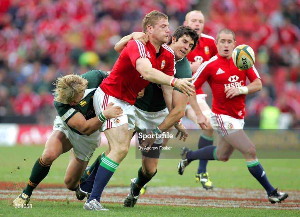 4 July 2009; Jamie Heaslip, British and Irish Lions, is tackled by Wynand Olivier and Jaque Fouie, South Africa. 3rd Test, South Africa v British and Irish Lions, Ellis Park, Johannesburg, South Africa. Picture credit: Andrew Fosker / SPORTSFILE