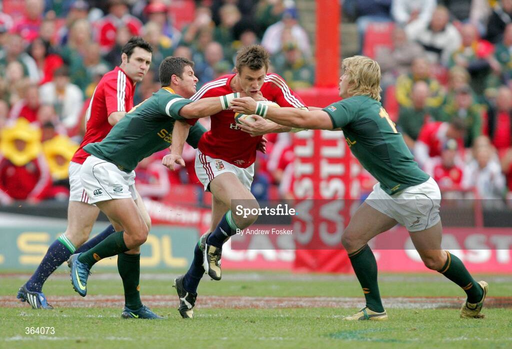 4 July 2009; Tommy Bowe, British and Irish Lions, tries to get through Wynand Olivier, right, and Morne Steyn, South Africa. 3rd Test, South Africa v British and Irish Lions, Ellis Park, Johannesburg, South Africa. Picture credit: Andrew Fosker / SPORTSFILE *** Local Caption ***  © Andrew Fosker / Seconds Left Images 2009 -  Tommy Bowe tackles -  Springboks v The British & Irish Lions - 3rd Test -  04/07/09 - Ellis Park , Johannesburg,  South Africa - All Rights Reserved
