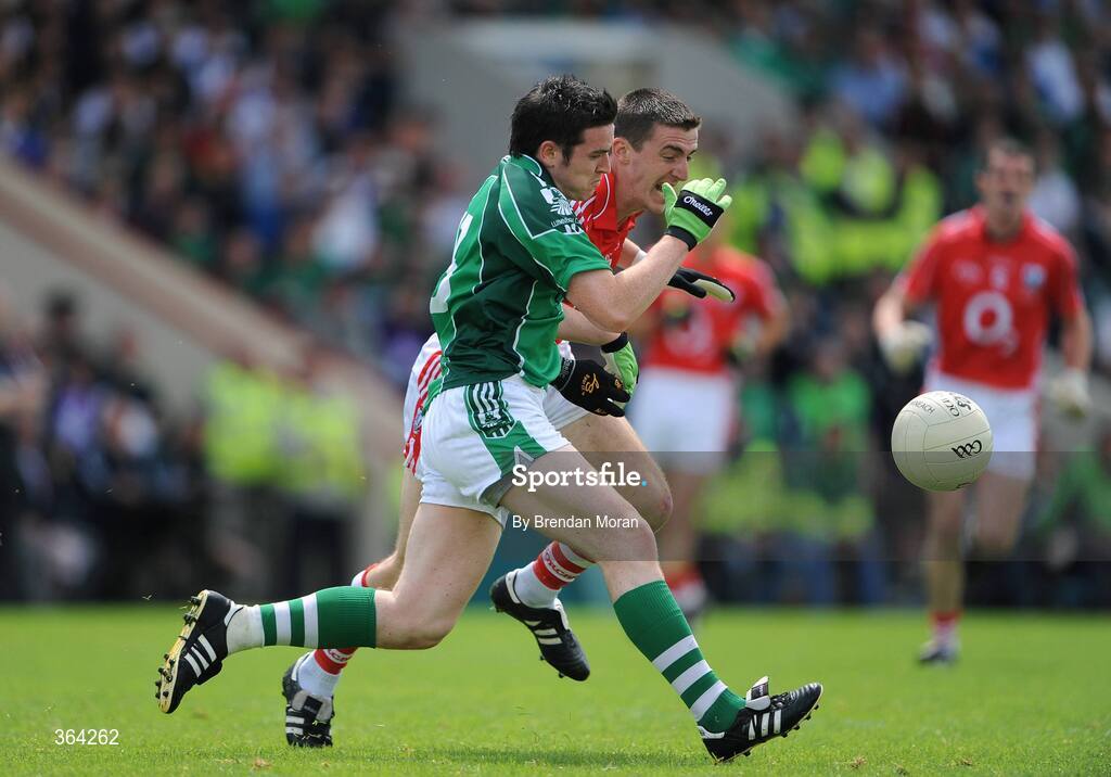 5 July 2009; Ger Collins, Limerick, in action against Ray Carey, Cork. GAA Football Munster Senior Championship Final, Limerick v Cork, Pairc Ui Chaoimh, Cork. Picture credit: Brendan Moran / SPORTSFILE