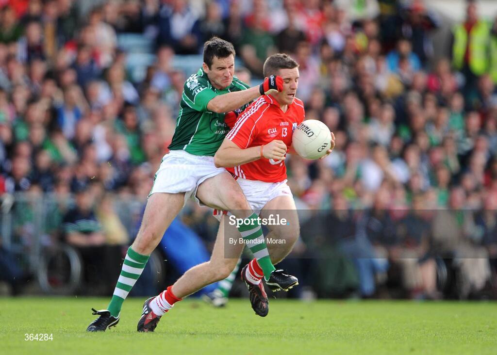5 July 2009; Daniel Goulding, Cork, is tackled by Mark O'Riordan, Limerick. GAA Football Munster Senior Championship Final, Limerick v Cork, Pairc Ui Chaoimh, Cork. Picture credit: Brendan Moran / SPORTSFILE
