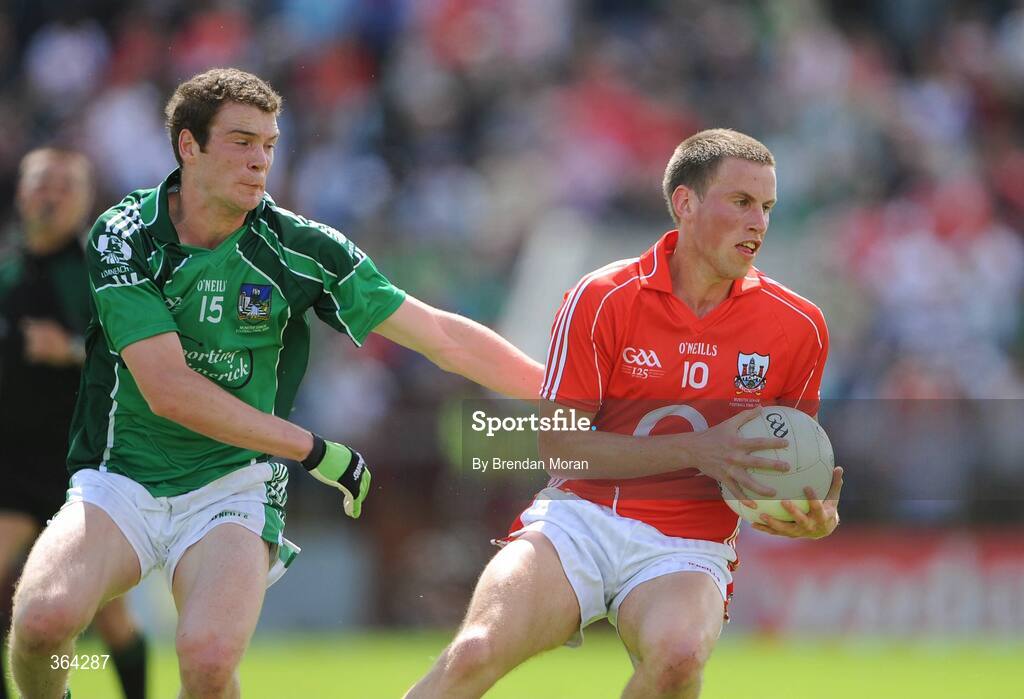 5 July 2009; Patrick Kelly, Cork, in action against Ian Ryan, Limerick. GAA Football Munster Senior Championship Final, Limerick v Cork, Pairc Ui Chaoimh, Cork. Picture credit: Brendan Moran / SPORTSFILE