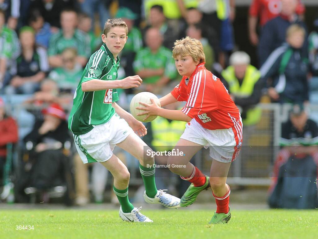5 July 2009; Dominic O'Shea, Cork, in action against Michael Donovan, Limerick. Irish Daily Star Sunday, Primary Go-Games, Limerick v Cork, Pairc Ui Chaoimh, Cork. Picture credit: Diarmuid Greene / SPORTSFILE