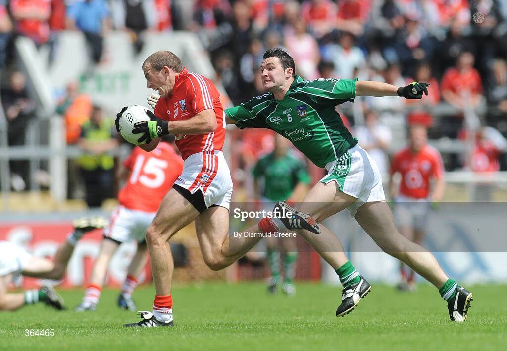 5 July 2009; Paudie Kissane, Cork, in action against Stephen Lucey, Limerick. GAA Football Munster Senior Championship Final, Limerick v Cork, Pairc Ui Chaoimh, Cork. Picture credit: Diarmuid Greene / SPORTSFILE