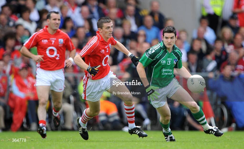 5 July 2009; Ger Collins, Limerick, in action against Ray Carey, Cork. GAA Football Munster Senior Championship Final, Limerick v Cork, Pairc Ui Chaoimh, Cork. Picture credit: Brendan Moran / SPORTSFILE