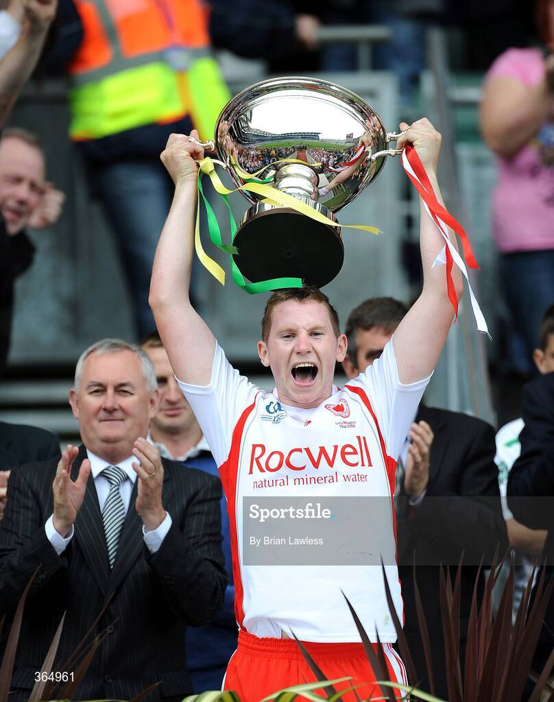 11 July 2009; Tyrone captain Stephen Donnelly lifts the Lory Meagher Cup alongside Uachtarán Chumann Lúthchleas Gael Criostóir Ó Cuana. Lory Meagher Cup Final, Tyrone v Donegal, Croke Park, Dublin. Picture credit: Brian Lawless / SPORTSFILE
