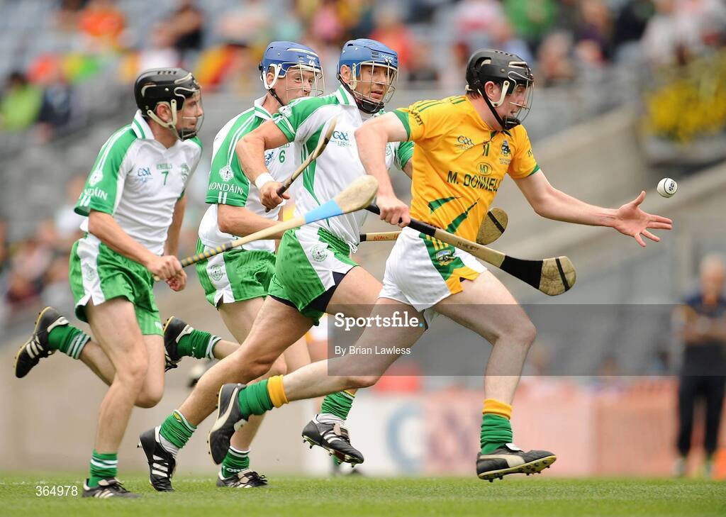11 July 2009; Neil Hackett, Meath, in action against, from left, Keith Kennedy, Niall Healy, and Fergus McMahon, London. Nicky Rackard Cup Final, Meath v London, Croke Park, Dublin. Picture credit: Brian Lawless / SPORTSFILE