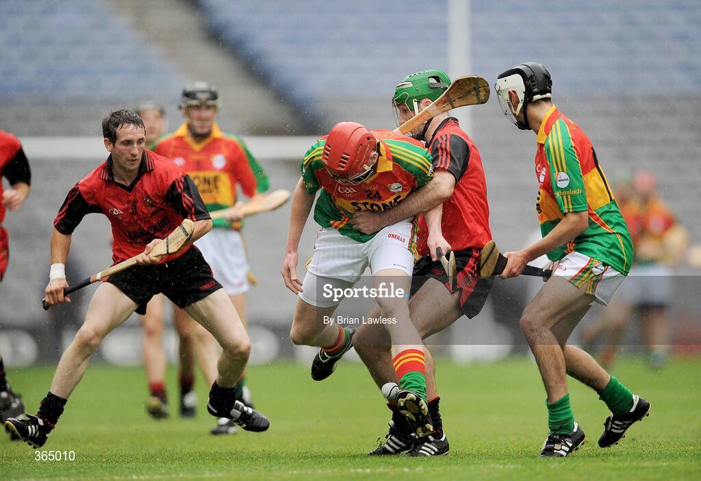 11 July 2009; Eddie Byrne and Craig Doyle, right, Carlow, in action against Ruairi McGrattan and Andy Savage, left, Down. Christy Ring Cup Final, Carlow v Down, Croke Park, Dublin. Picture credit: Brian Lawless / SPORTSFILE