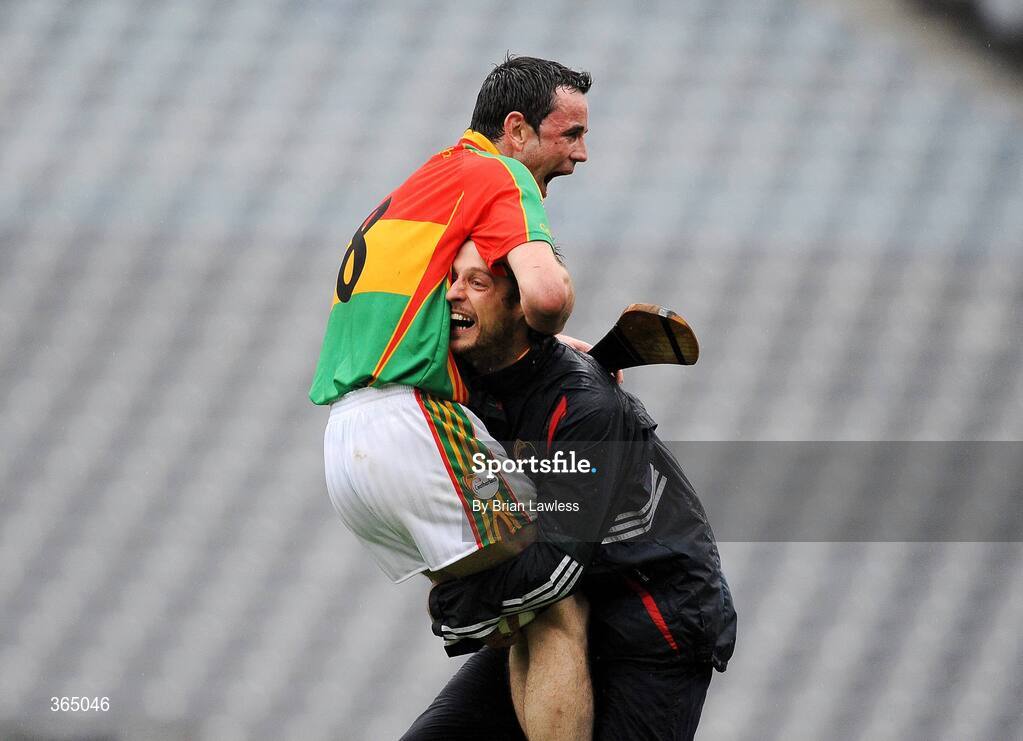 11 July 2009; Carlow's Barry Cox, right, lifts team-mate James Hickey in celebration after the match. Christy Ring Cup Final, Carlow v Down, Croke Park, Dublin. Picture credit: Brian Lawless / SPORTSFILE