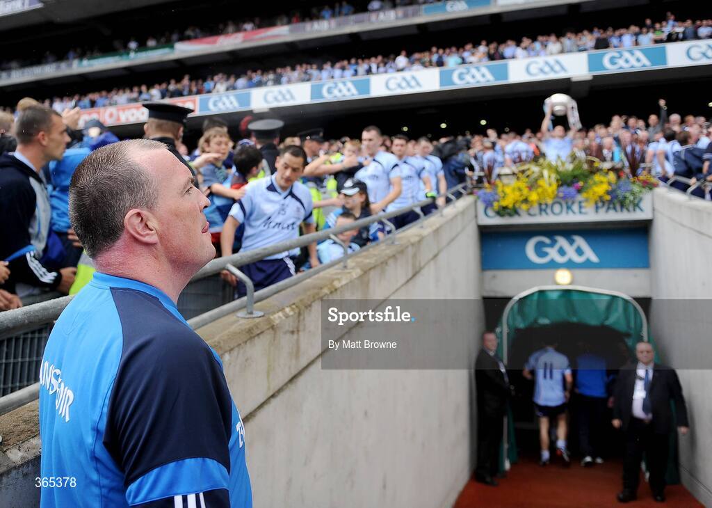 12 July 2009; Dublin manager Pat Gilroy watches as his players lift the Delaney Cup. GAA Football Leinster Senior Championship Final, Dublin v Kildare, Croke Park, Dublin. Picture credit: Matt Browne / SPORTSFILE