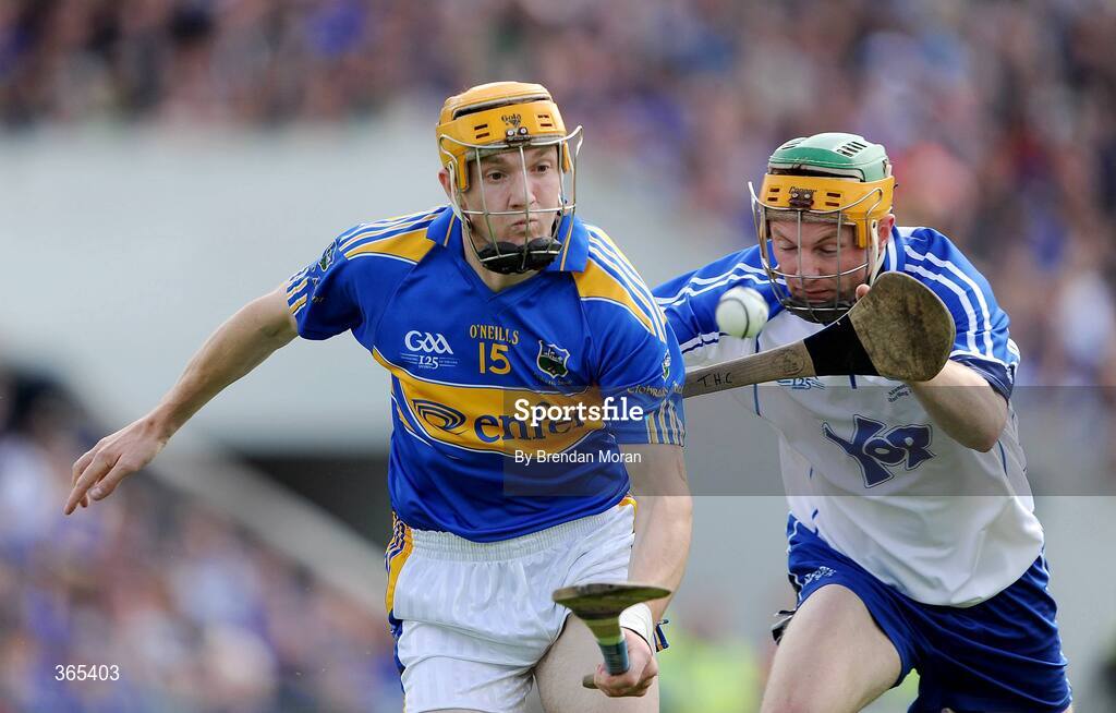 12 July 2009; Lar Corbett, Tipperary, in action against Aidan Kearney, Waterford. GAA Hurling Munster Senior Championship Final, Tipperary v Waterford, Semple Stadium, Thurles, Co. Tipperary. Picture credit: Brendan Moran / SPORTSFILE