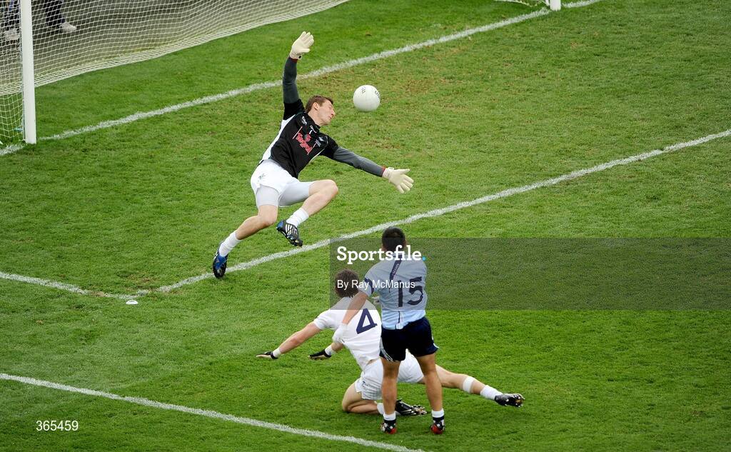 12 July 2009; Jason Sherlock shoots past the Kildare corner-back Emmet Bolton and goalkeeper Tom Corley to score the second of Dublin's two goals. GAA Football Leinster Senior Championship Final, Dublin v Kildare, Croke Park, Dublin. Picture credit: Ray McManus / SPORTSFILE