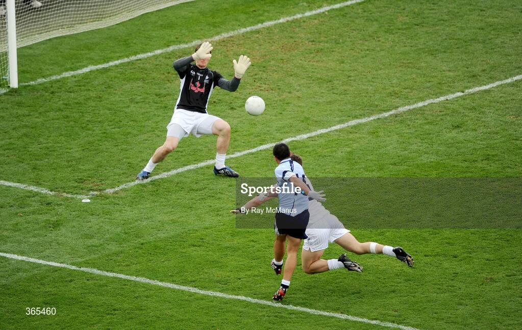 12 July 2009; Jason Sherlock shoots past the Kildare corner-back Emmet Bolton and goalkeeper Tom Corley to score the second of Dublin's two goals. GAA Football Leinster Senior Championship Final, Dublin v Kildare, Croke Park, Dublin. Picture credit: Ray McManus / SPORTSFILE