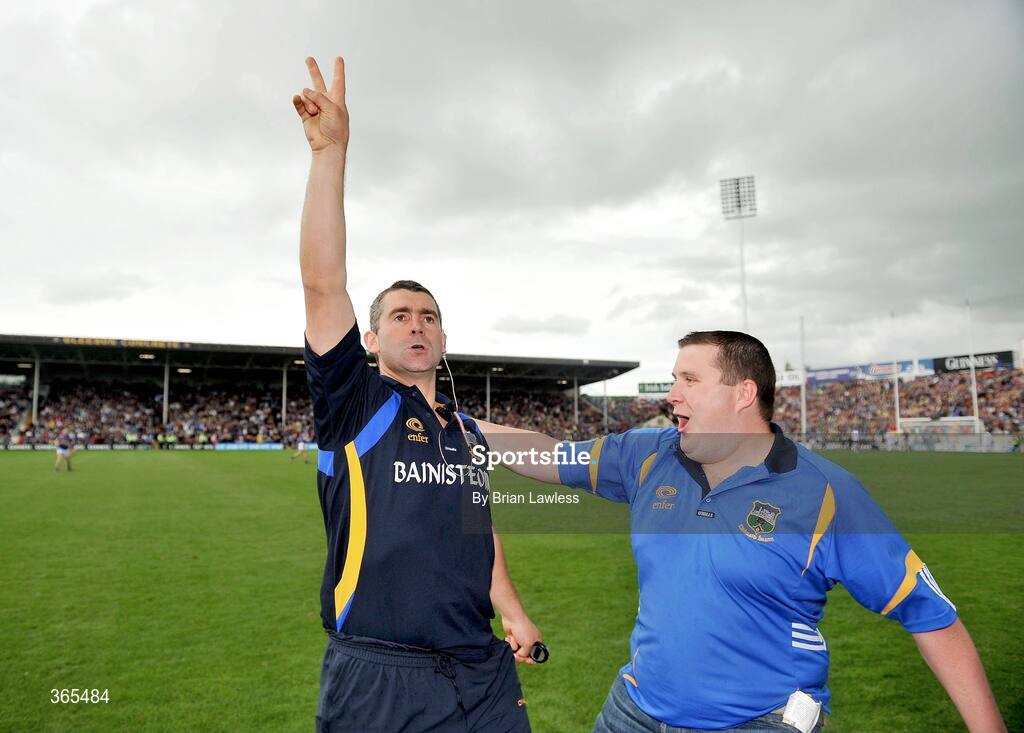 12 July 2009; Tipperary manager Liam Sheedy celebrates with a fan at the final whistle. GAA Hurling Munster Senior Championship Final, Tipperary v Waterford, Semple Stadium, Thurles, Co. Tipperary. Picture credit: Brian Lawless / SPORTSFILE