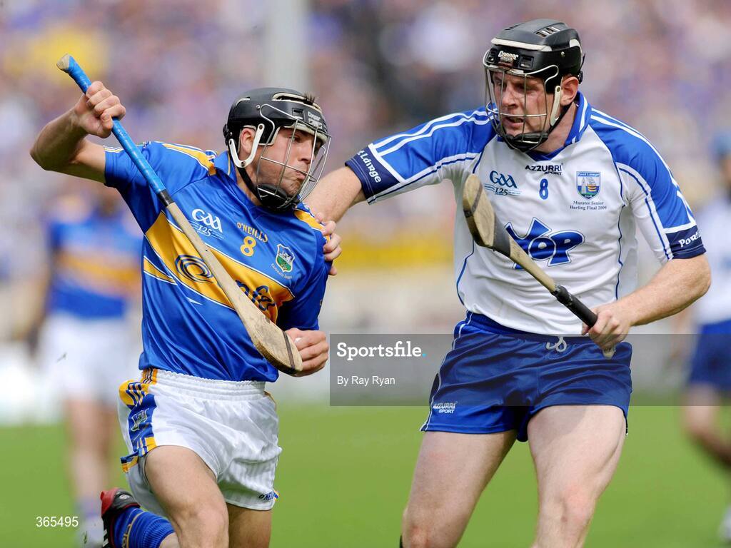 12 July 2009; James Woodlock, Tipperary, in action against Kevin Moran, Waterford. GAA Hurling Munster Senior Championship Final, Tipperary v Waterford, Semple Stadium, Thurles, Co. Tipperary. Picture credit: Ray Ryan / SPORTSFILE