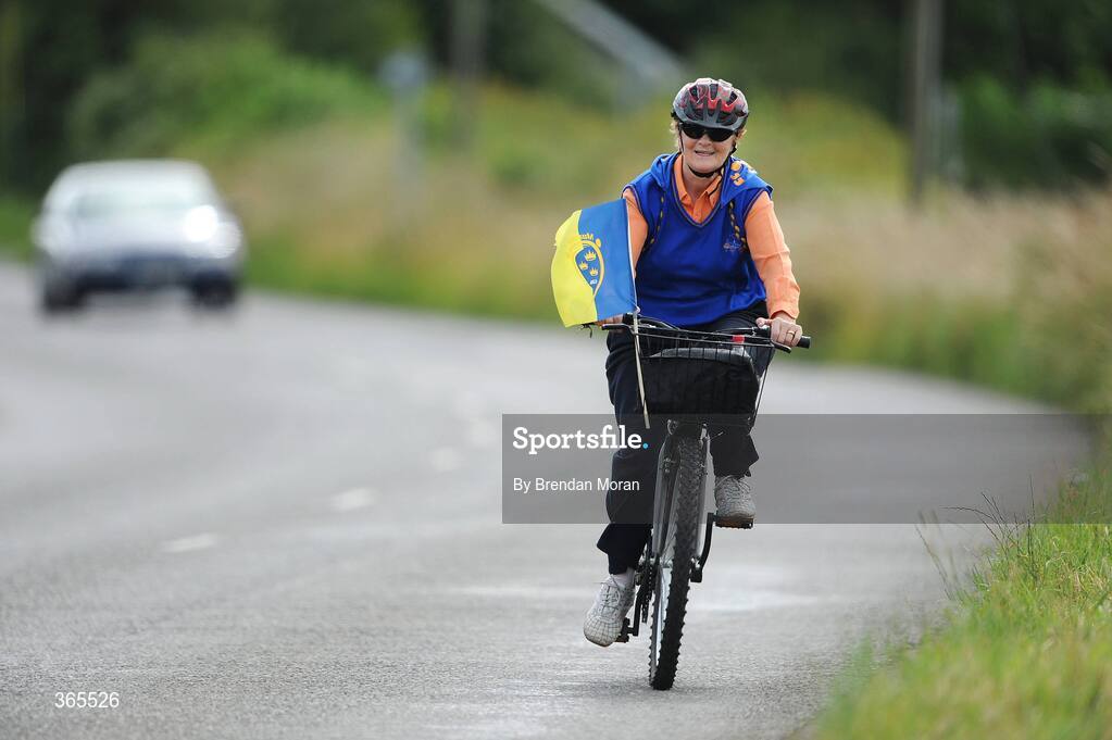 12 July 2009; Mary Delaney, from Holycross, Co. Tipperary, cycles to Thurles ahead of the Munster Hurling Finals. GAA Hurling Munster Senior Championship Final, Tipperary v Waterford, Semple Stadium, Thurles, Co. Tipperary. Picture credit: Brendan Moran / SPORTSFILE