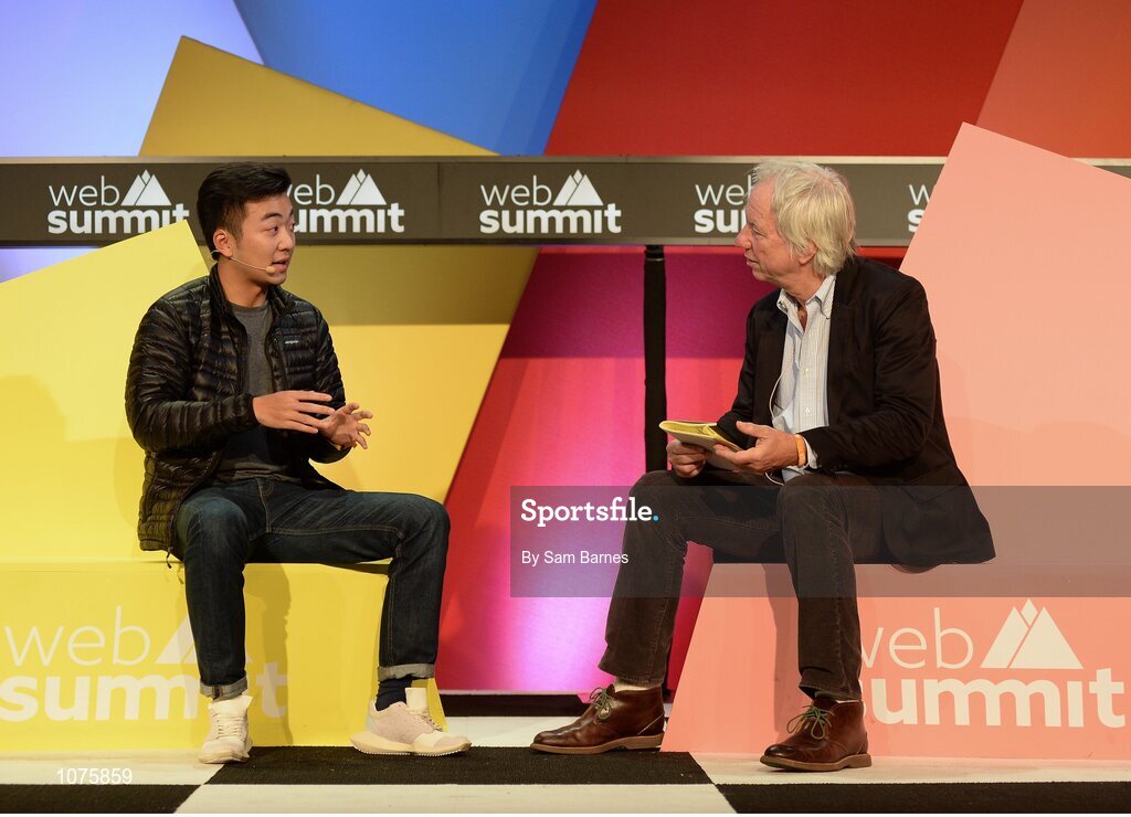 5 November 2015; Carl Pei, left, OnePlus, responds to a question from Spencer Reiss, WIRED Magazine, on the Marketing Stage during Day 3 of the 2015 Web Summit in the RDS, Dublin, Ireland. Picture credit: Sam Barnes / SPORTSFILE / Web Summit