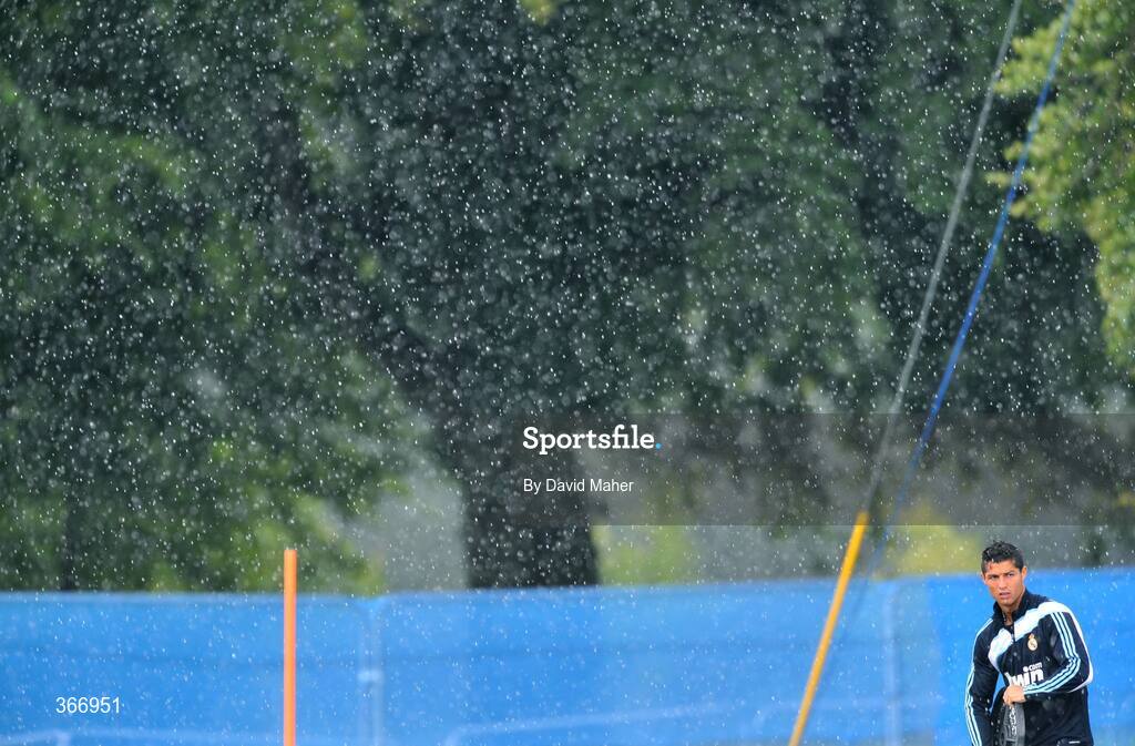 18 July 2009; Real Madrid's Cristiano Ronaldo during heavy rain at squad training. Real Madrid pre-season squad training, Carton House, Maynooth, Co. Kildare. Picture credit: David Maher / SPORTSFILE