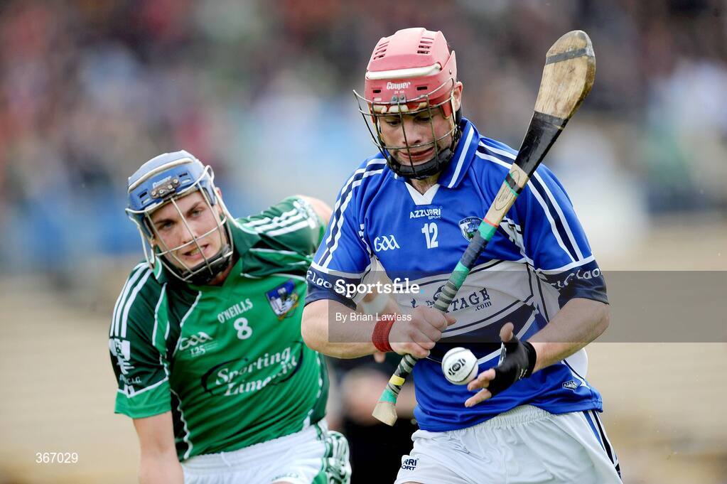 18 July 2009; Owen Holohan, Laois, in action against Gavin O'Mahoney, Limerick. GAA All-Ireland Senior Hurling Championship, Phase 3, Laois v Limerick, Semple Stadium, Thurles, Co. Tipperary. Picture credit: Brian Lawless / SPORTSFILE