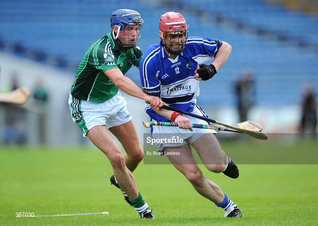18 July 2009; Owen Holohan, Laois, in action against Gavin O'Mahoney, Limerick. GAA All-Ireland Senior Hurling Championship, Phase 3, Laois v Limerick, Semple Stadium, Thurles, Co. Tipperary. Picture credit: Brian Lawless / SPORTSFILE