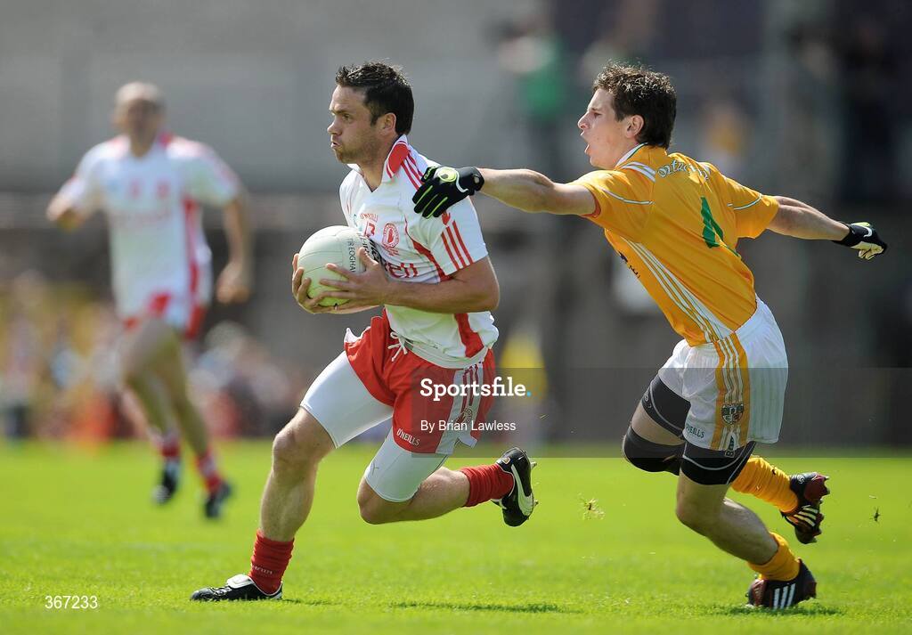 19 July 2009; Martin Penrose, Tyrone, in action against Kevin O'Boyle, Antrim. GAA Football Ulster Senior Championship Final, Tyrone v Antrim, St Tighearnach's Park, Clones, Co. Monaghan. Picture credit: Brian Lawless / SPORTSFILE