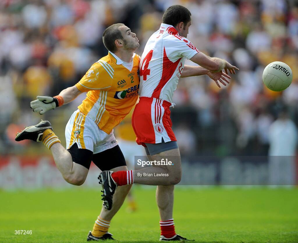 19 July 2009; Colin Brady, Antrim, tackles Stephen O'Neill, Tyrone. GAA Football Ulster Senior Championship Final, Tyrone v Antrim, St Tighearnach's Park, Clones, Co. Monaghan. Picture credit: Brian Lawless / SPORTSFILE