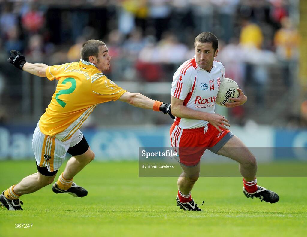 19 July 2009; Stephen O'Neill, Tyrone, in action against Colin Brady, Antrim. GAA Football Ulster Senior Championship Final, Tyrone v Antrim, St Tighearnach's Park, Clones, Co. Monaghan. Picture credit: Brian Lawless / SPORTSFILE