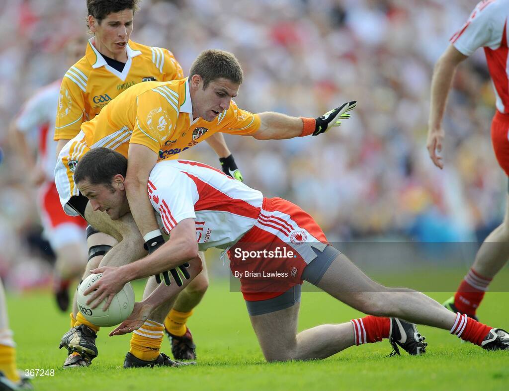 19 July 2009; Stephen O'Neill, Tyrone, in action against Tony Scullion and Kevin O'Boyle, left, Antrim. GAA Football Ulster Senior Championship Final, Tyrone v Antrim, St Tighearnach's Park, Clones, Co. Monaghan. Picture credit: Brian Lawless / SPORTSFILE